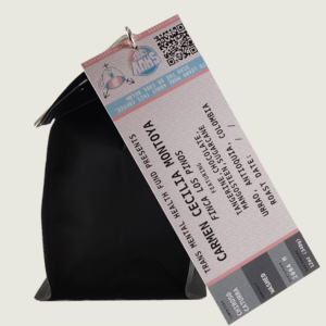 A black coffee bag with a concert ticket label.