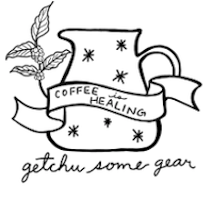 A carafe with black stars on it, with a coffee plant leaf growing from one side, a banner across reading "coffee is healing," and text underneath reading "getchu some gear"