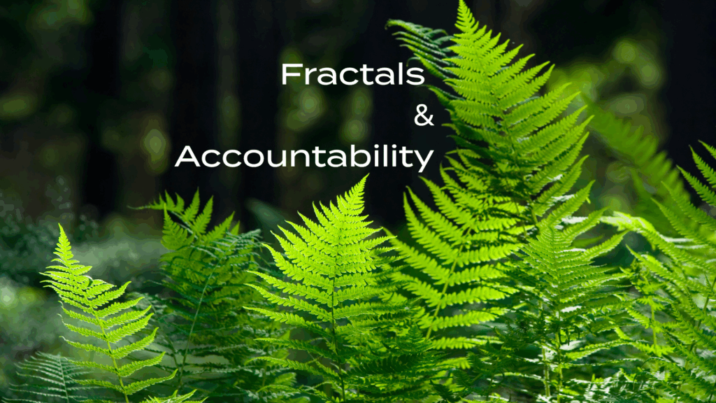 A patch of green ferns; ferns are a fractal element of nature that are often used as an example of emergent strategies. Each smaller component of the fern resembles the larger unit of a fern itself.